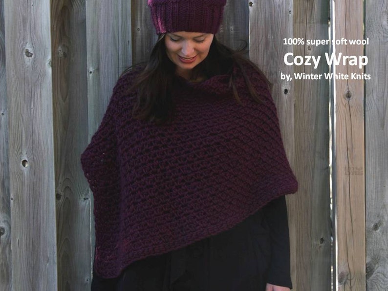 May include: A woman wearing a burgundy crocheted wrap made of 100% super soft wool. The wrap is called "Cozy Wrap" by Winter White Knits.