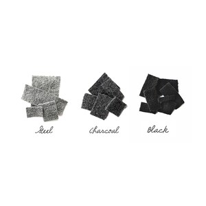 May include: Three swatches of fabric in different shades of gray: steel, charcoal, and black.
