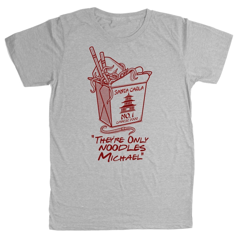 May include: A light gray t-shirt featuring a red graphic of a Chinese food takeout box with noodles and chopsticks. The text on the box reads "SANTA CARLA NO. 1 CHINESE FOOD". Below the box, the text reads "THEY'RE ONLY NOODLES MICHAEL".