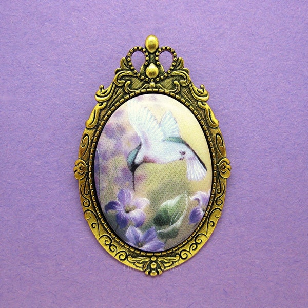 Porcelain HUMMINGBIRD and Purple VIOLETS Flowers Cameo Costume Jewelry on a Goldtone Pin Brooch Pendant for Mothers Day or Birthday Gift