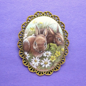 Porcelain Bunny Rabbits Bunnies Hare Rabbit with White and Yellow Daisies Flowers Cameo Goldtone Pin Brooch for Birthday or Christmas Gift