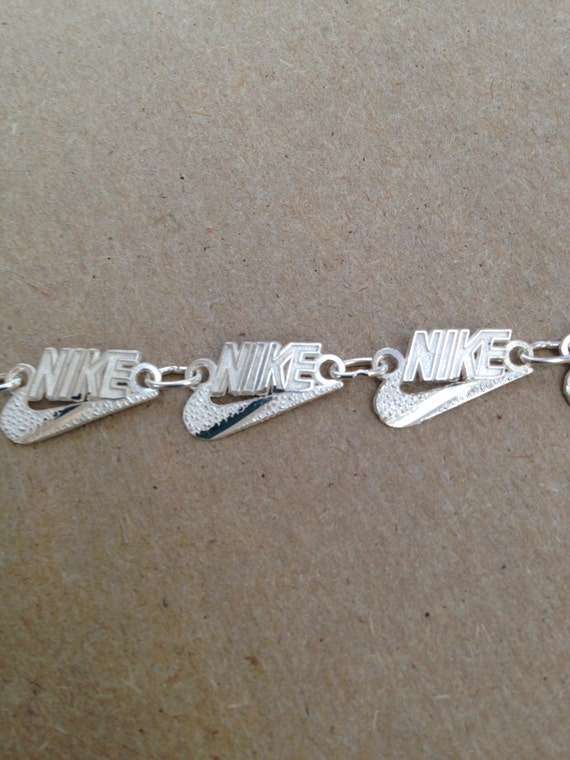 nike swoosh bracelet