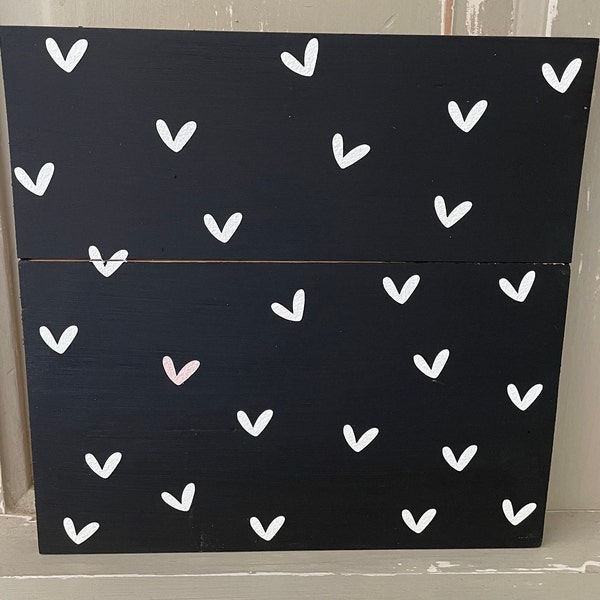 Hearts abound in this background sign goes perfectly in a babies room or a wedding shower