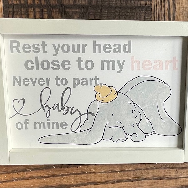 Baby Dumbo sleeping to his mothers lullaby perfect homemade wood sign with a song quote from the movie