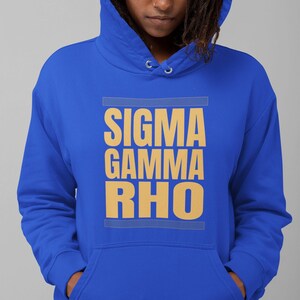May include: A royal blue hoodie with a gold and white graphic that says "Sigma Gamma Rho".