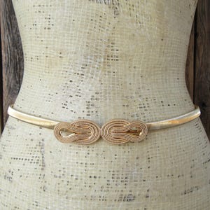 1990s Gold Metal Stretch Belt | 80s 90s Oval Knot Buckle Gold Tone Metal Skinny Slinky Belt | 26 to 34