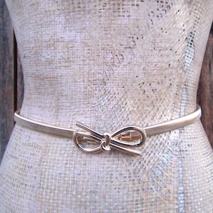 1990s Gold Metal Bow Tie Stretch Belt | 80s 90s Bow Buckle Gold Metal Skinny Slinky Belt | 25 to 32