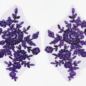 May include: A set of three ceramic nesting bowls in shades of blue, green, and white. The bowls feature a speckled glaze and a simple, modern design. The largest bowl measures approximately 8 inches in diameter.