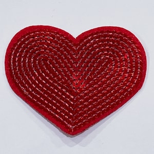 May include: A red heart-shaped patch with a velvet-like texture. The heart is embellished with rows of shiny, red sequins, creating a textured, eye-catching design. The patch is likely for decorative purposes, such as clothing or accessories.