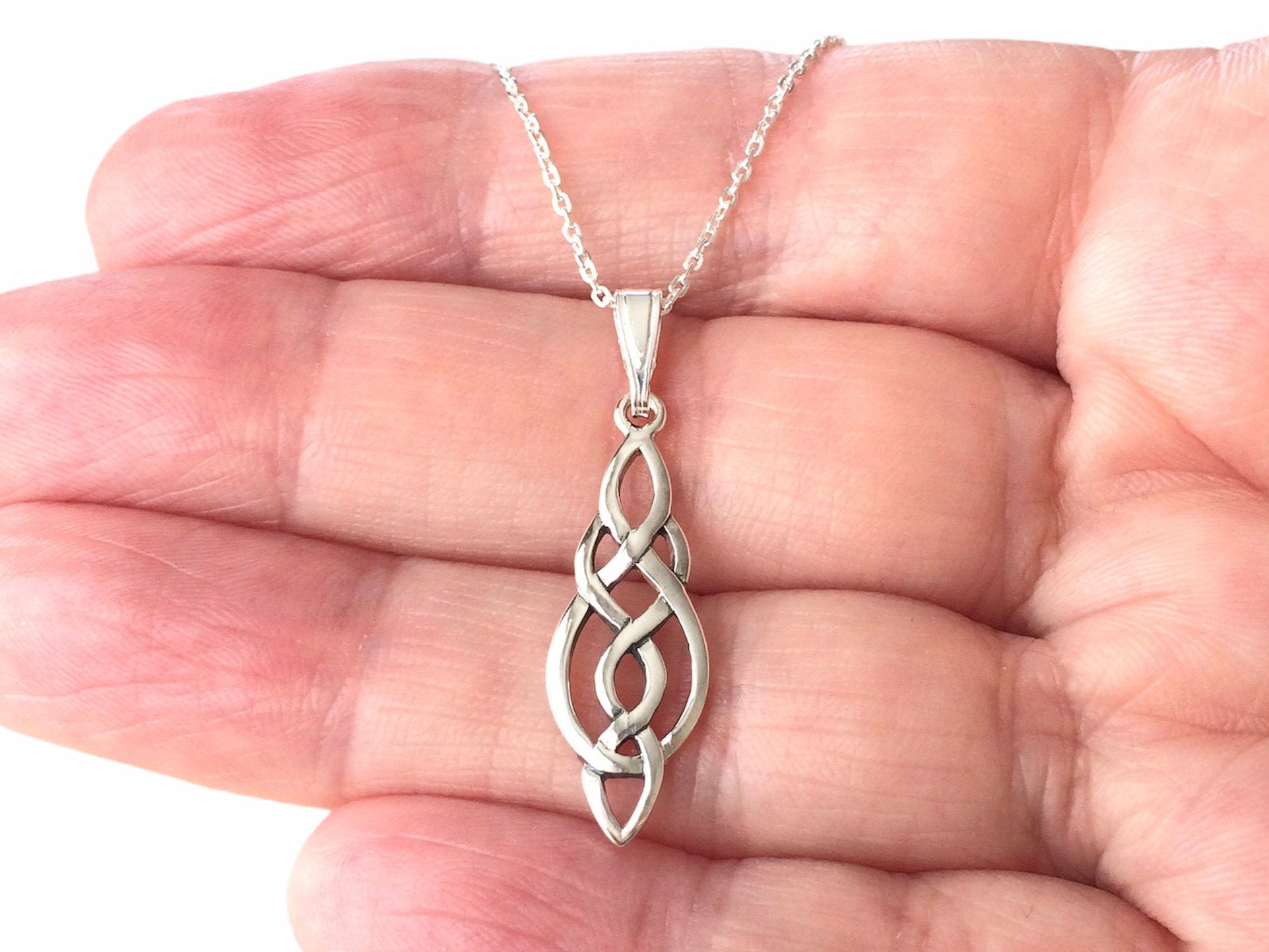 Long silver hotsell knot necklace