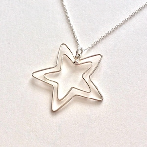 Sterling Silver Star in a Star Pendant Necklace.