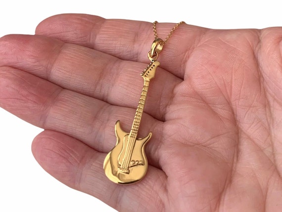 Magnifique Pendentif guitare électrique en V hyper stylé !