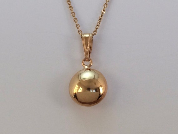 Gold over silver best sale pendants