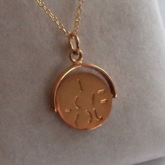 Silver i love you shop spinner necklace