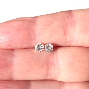 Sterling Silver 4mm White Topaz Stud Earrings.