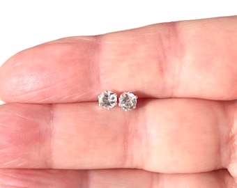 Sterling Silver 4mm White Topaz Stud Earrings.