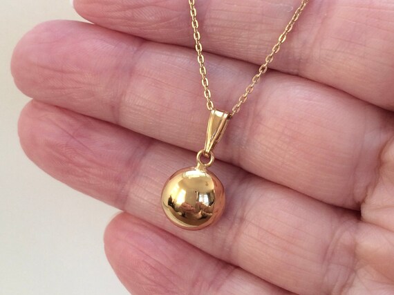 Gold over silver best sale pendants