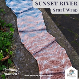 May include: A knitted scarf or wrap in a sunset river colourway. The scarf is made with a gradient yarn that transitions from blue to pink. The scarf is lying on a stone surface with green plants in the background. The text "SUNSET RIVER Scarf/Wrap" is at the top of the image. The text "*knitting* *pattern*" is at the bottom of the image. The text "Design & Copyright: Valentina Consalvj." is at the bottom of the image. The text "Snailyarn" is at the bottom of the image.