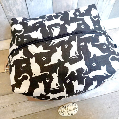 Metallic pink toiletry sales box, cat toiletry bag, black wipes