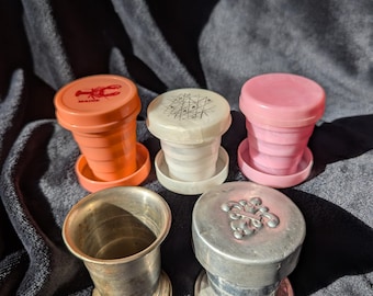 Vintage Collapsible Cups Silver, Pink, White/ Metal and Plastic / Travel Cup Collectibles / Fleur-de-Lis Embossed Lid / Maine Lobster Lid /