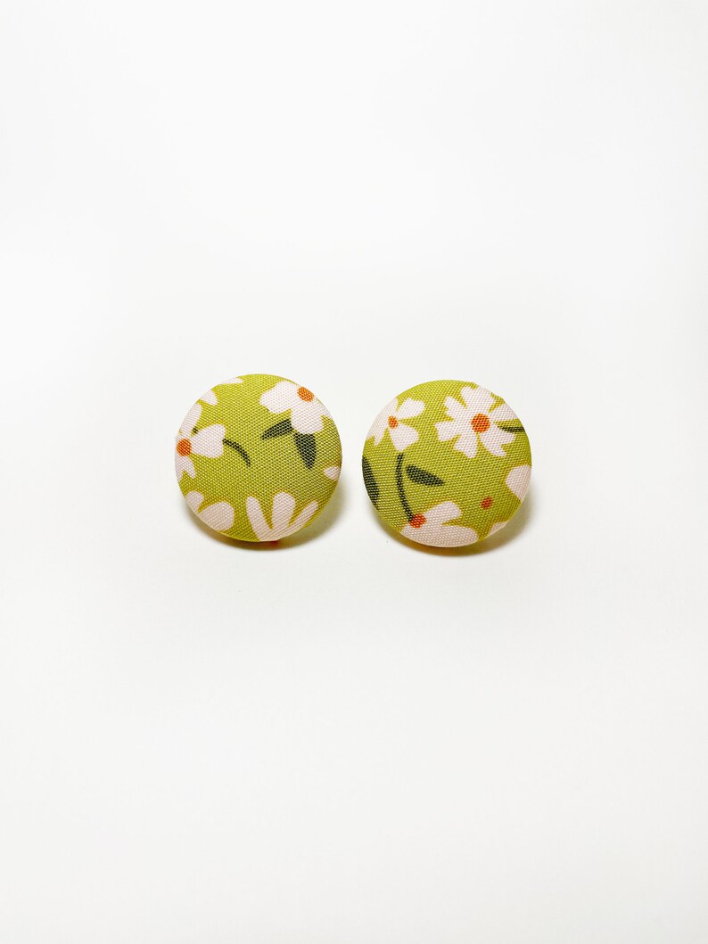 Handmade green floral fabric covered post earrings.