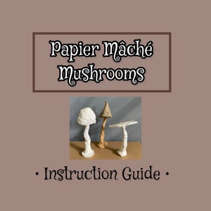 May include: Three papier-mâché mushrooms, two white and one brown, are arranged on a brown surface. The title "Papier mâché Mushrooms" is above the image, and the text "Instruction Guide" is below the image.