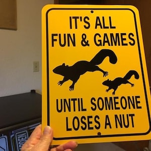 It&#39;s all fun and games until someone loses a nut Funny Squirrel Sign 9x12 inch Aluminum metal garden sign