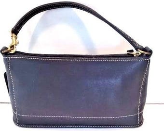 Black leather Coach handbag, brass metal hardware & contrasting stitching