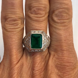 Vintage Emerald Cut Emerald and diamond ring in Platinum image 6