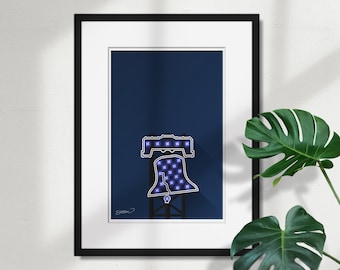 May include: A framed print of a blue and white illustration of the Liberty Bell, a famous landmark in Philadelphia, Pennsylvania. The bell is outlined in white and filled with a pattern of small white stars. The background is a dark blue color.