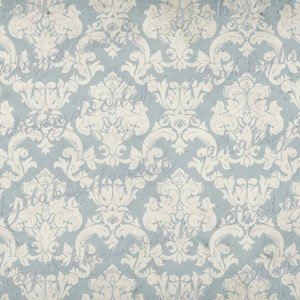 May include: A seamless pattern of a light blue background with a white damask design. The pattern is repeated throughout the image.