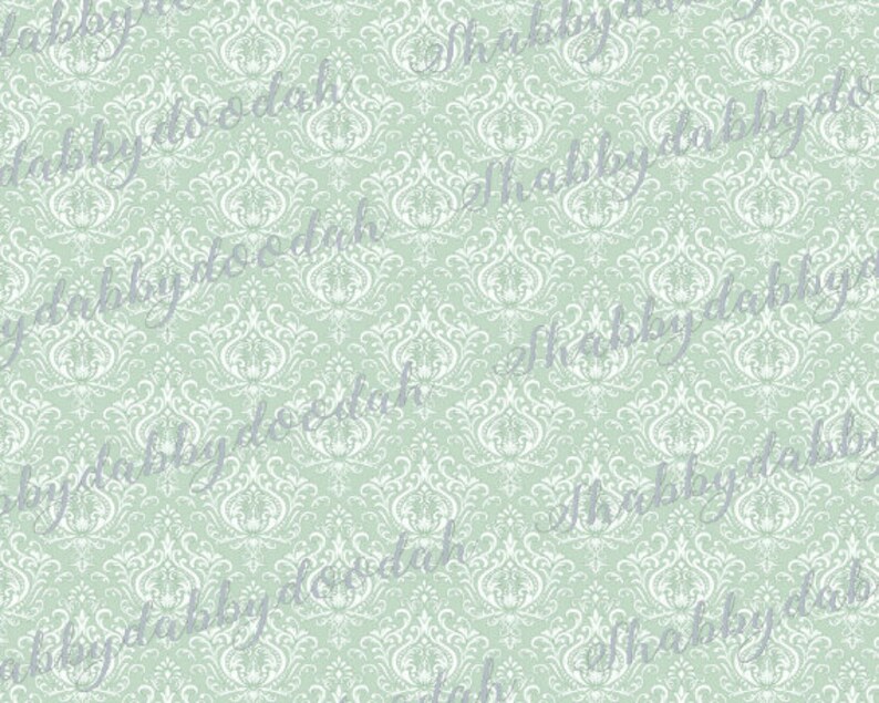 May include: A seamless pattern featuring a white damask design on a light green background. The pattern is repeated throughout the image. The text "shabby doo dah" is written in a cursive font in gray on top of the pattern.