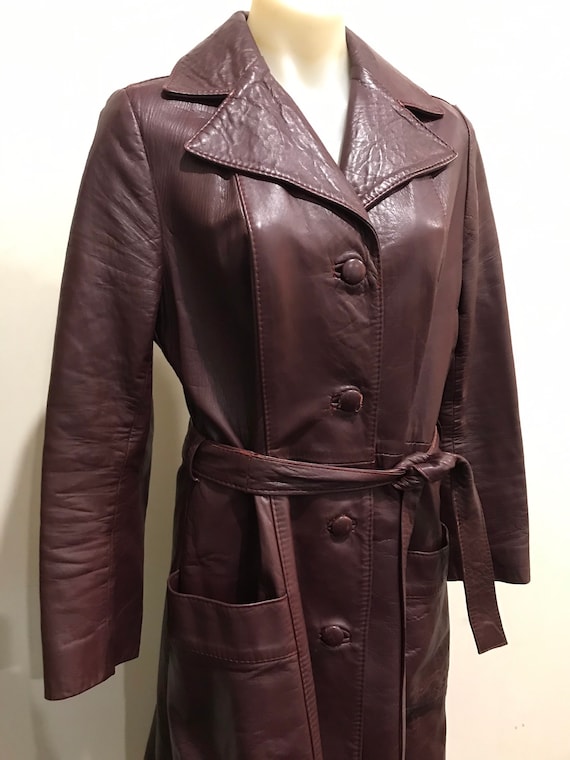 Gorgeous vintage 1970s belted burgundy leather coa