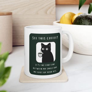 Snarky Not a Morning Person Cat Sipping Coffee Ceramic Mug image 1