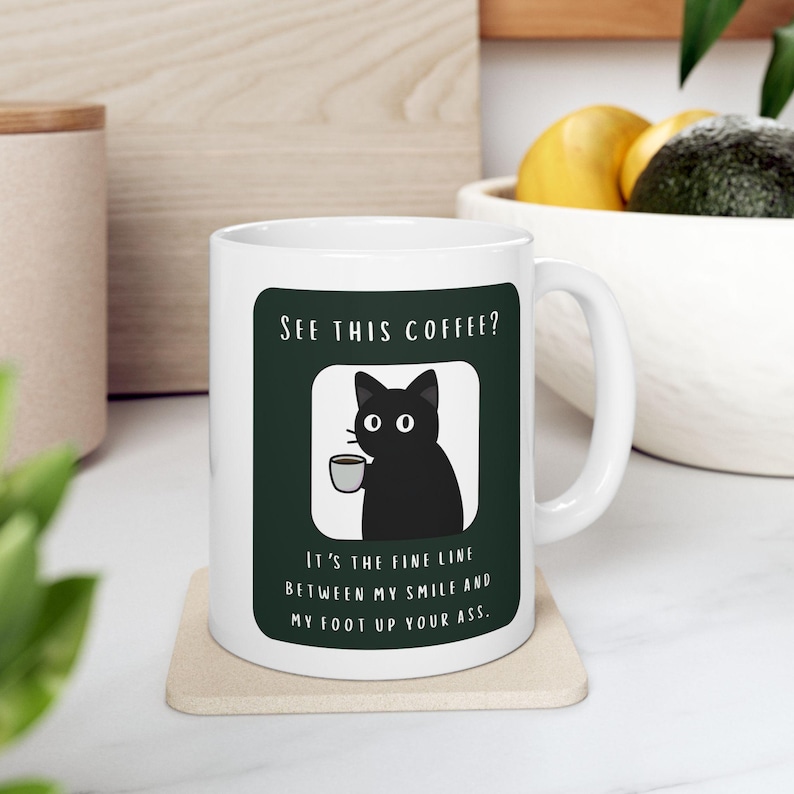 Snarky Not a Morning Person Cat Sipping Coffee Ceramic Mug image 1