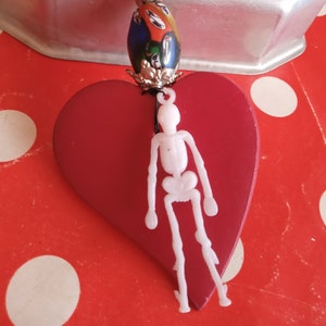 Skeleton heart brooch made with love