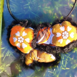 Necklace flowers of vintage fabric