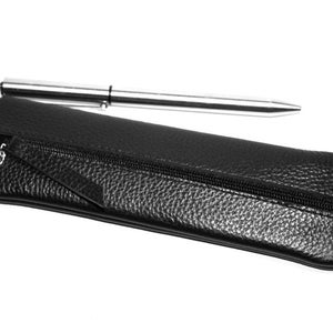 May include: A black leather pencil case with a zipper closure and a silver pen inside.
