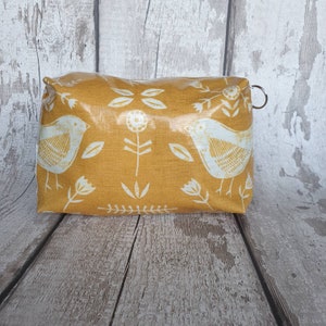 Yellow  scandi bird Oilcloth wash bag. Narvik yellow large makeup bag. Mustard Oilcloth Toiletry bag. Beauty pouch. Bird beauty bag