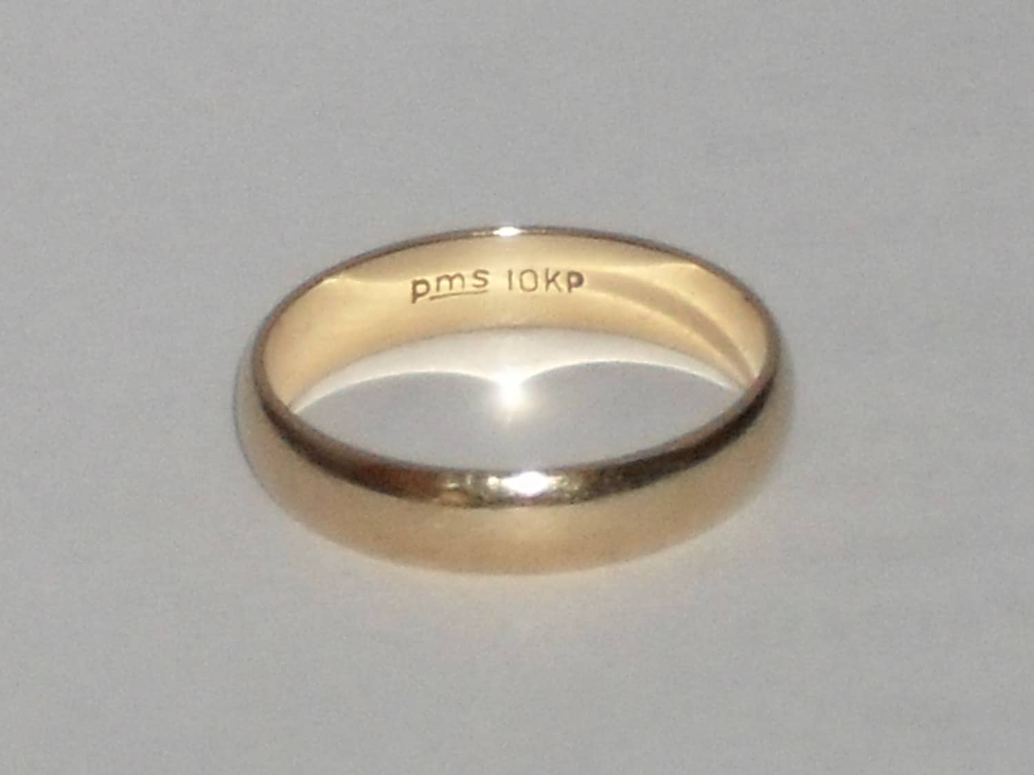 Pms 10kp gold squeezmo ring