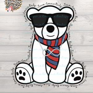May include: A white cartoon polar bear wearing black sunglasses, a red and blue striped scarf, and an infinity symbol necklace. The bear has black paw prints and is surrounded by text that says "Team Lonnie Baby".