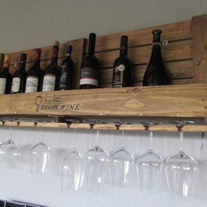 Upcycle wine rack from well-travelled industrial range "Save Water....