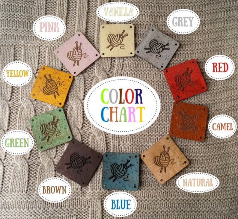 May include: Color chart with yarn ball designs on wooden squares. Colors include pink, yellow, green, brown, blue, vanilla, grey, red, camel, and natural.