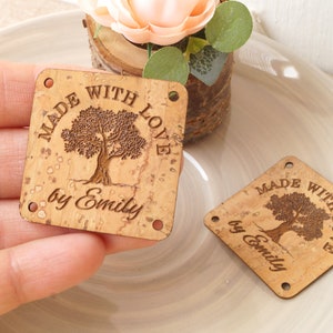 May include: Two square cork tags with a tree design and the text "Made with Love by Emily".