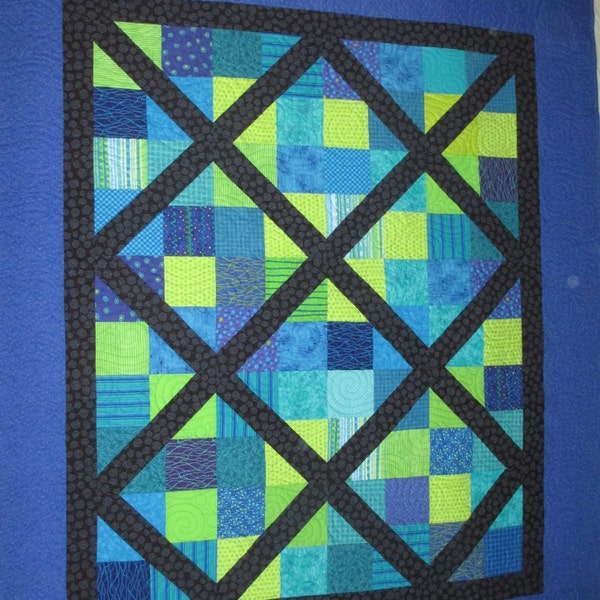 Jewel tone quilt of blues and greens