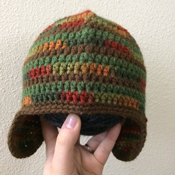 brown earflap hat