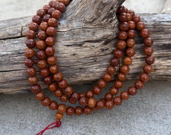 Handmade Tibetan Lotus Seed Mala | Buddhist Prayer Beads with Silk Pouch
