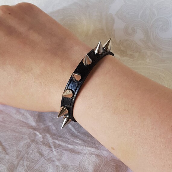 spiked bracelet meaning