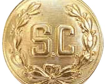 Santa lost a button ! A child found it under the tree