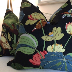 GP and J Baker “Nympheus” in linen Teal and Green on black pillow covers